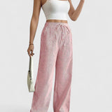 Maria - Calças largas confortáveis com detalhes elegantes